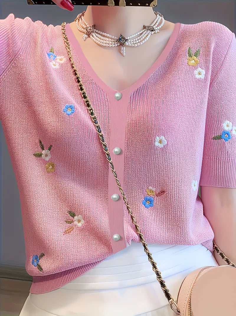 Rita - pulóver s kvetinovým motívom a zapínaním na gombíky pre elegantný vzhľad