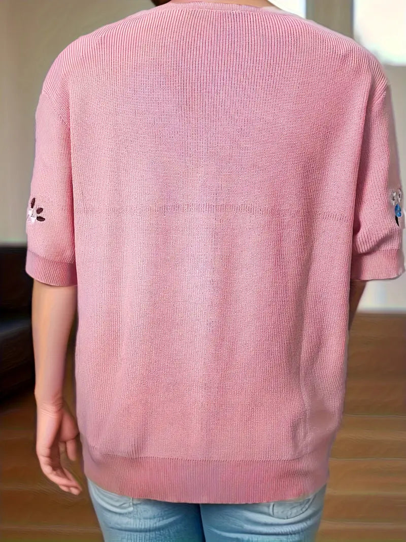 Rita - pulóver s kvetinovým motívom a zapínaním na gombíky pre elegantný vzhľad