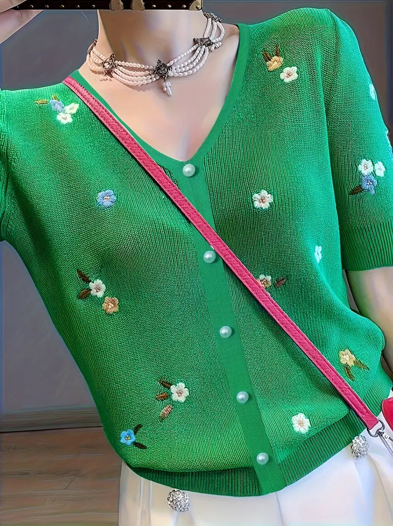 Rita - pulóver s kvetinovým motívom a zapínaním na gombíky pre elegantný vzhľad