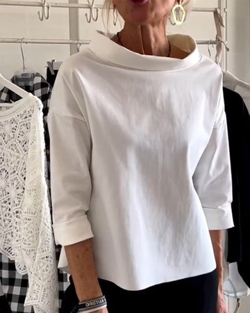 Weißes Netz-Top mit Revers – Zeitlose Eleganz neu definiert