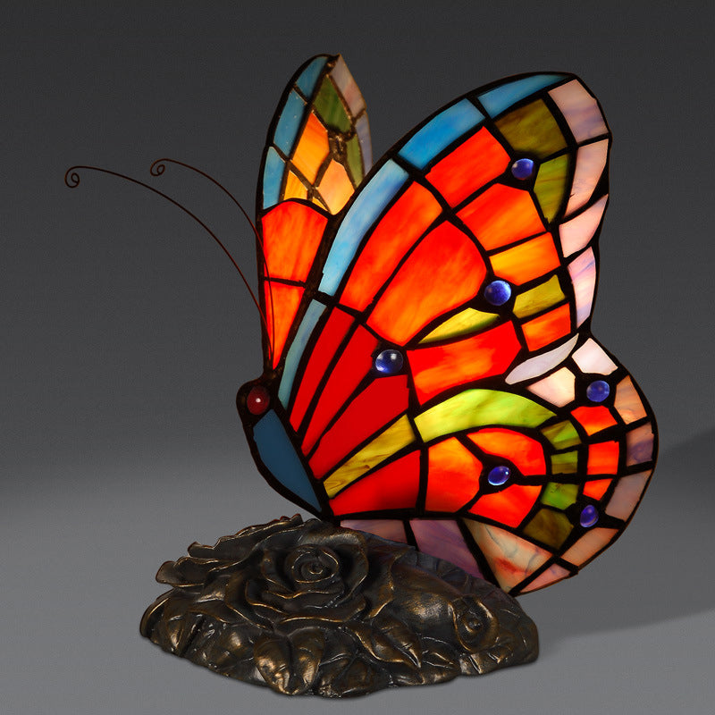 ElegantLight - Atmosphärische Nachttischlampe mit Schmetterlingskopf und Rosenfuß
