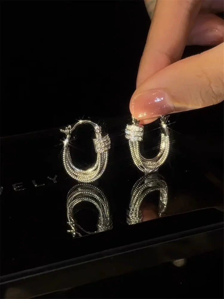 Orecchini da donna Aria geometrici a più strati in oro o argento