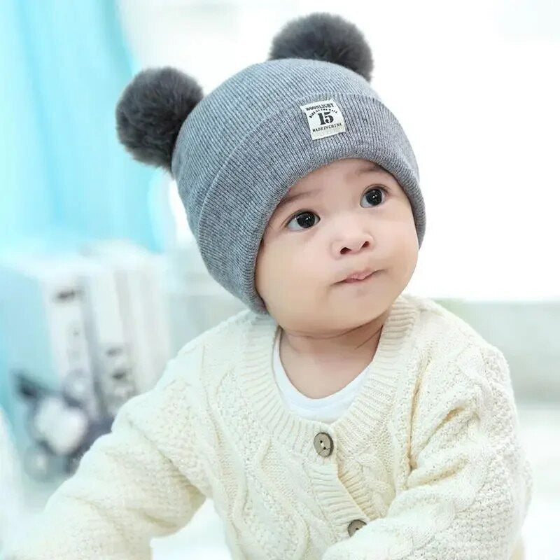 Cappello invernale per bambini con pon pon