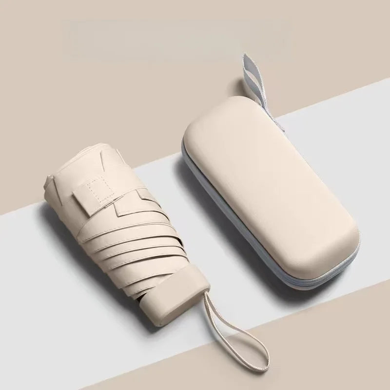Mini-parapluie résistant aux UV et imperméable, compact pour voyages et excursions