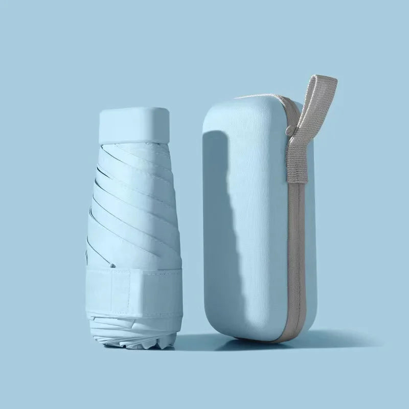 Mini-parapluie résistant aux UV et imperméable, compact pour voyages et excursions