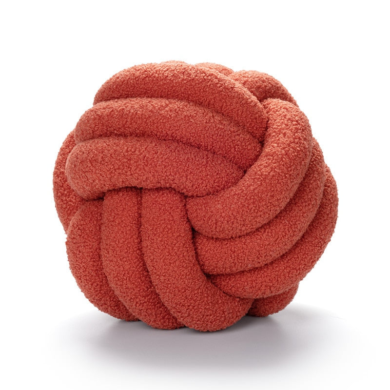 Knotiva – Pyntepude i bomuldsfleece med trefoldet knudedesign