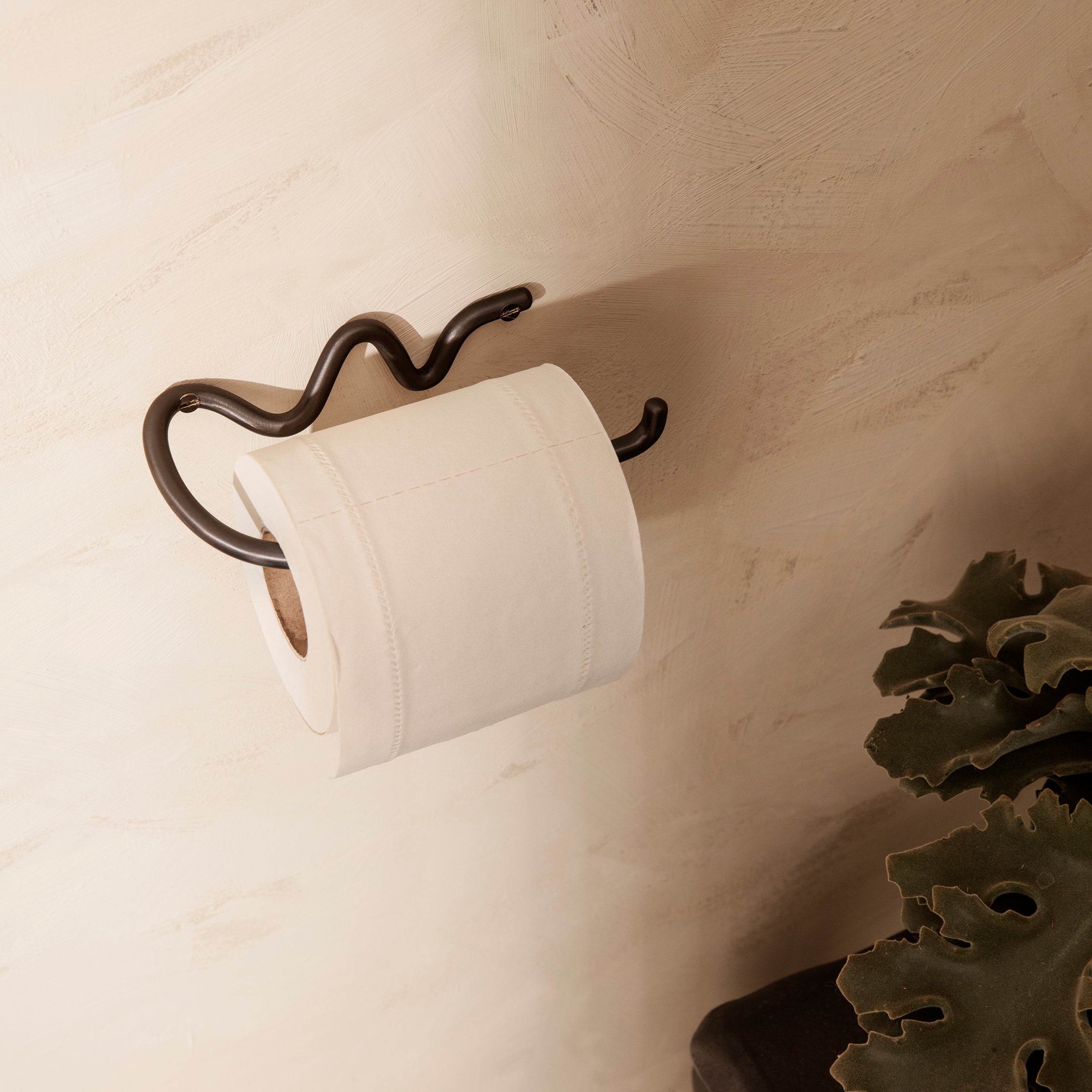 Support de papier toilette incurvé