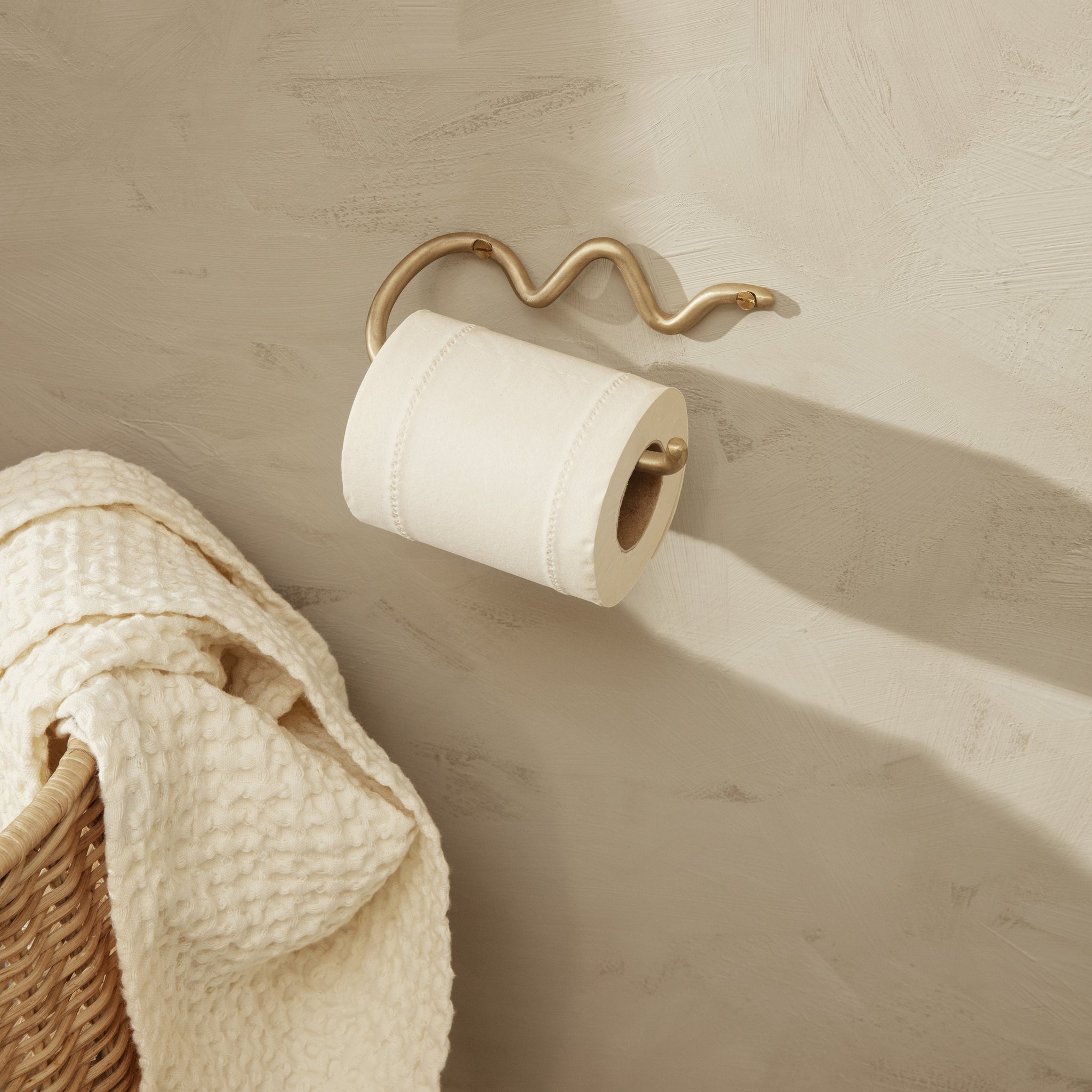 Support de papier toilette incurvé